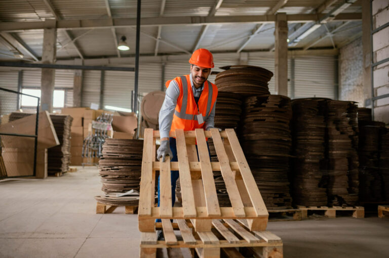 man-working-with-heavy-wooden-materials (1)